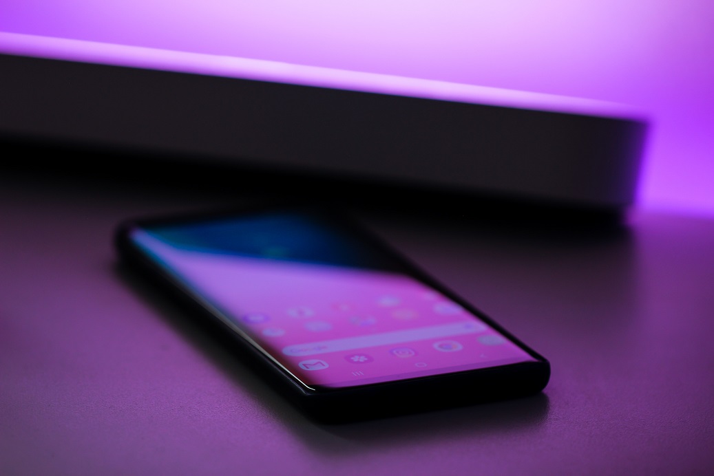 a-cellphone-in-purple-light